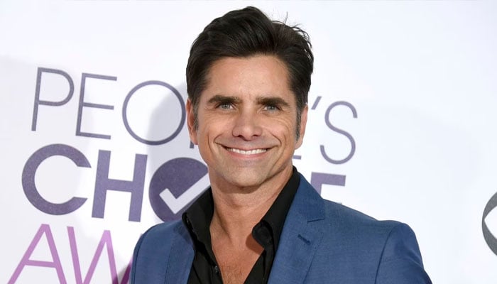 John Stamos knows what it was about him that kept him from a George Clooney career in Hollywood
