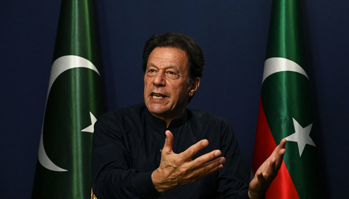 Former prime minister Imran Khan gestures as he speaks during an interview with AFP at his residence in Lahore on May 18, 2023. — AFP