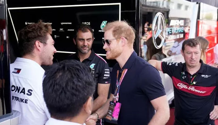 Prince Harry is on top of the world as he lets go anxiety at US Grand Prix
