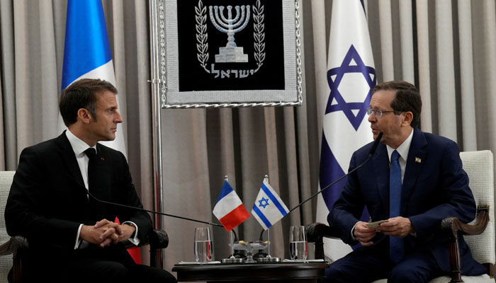 French President Emmanuel Macron, left, meets Israels President Isaac Herzog in Jerusalem, Tuesday, Oct. 24, 2023. — Reuters