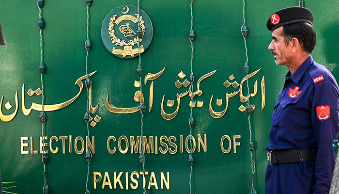 A security personnel stands guard at the headquarters of Election Commission of Pakistan in Islamabad on September 21, 2023. — AFP