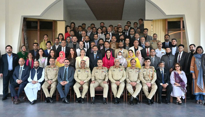 Chief of the Army Staff (COAS) Gen Syed Asim Munir poses for a group photo with participants of National Security Workshop – 25 at the General Headquarters in Rawalpindi on October 26, 2023. — ISPR