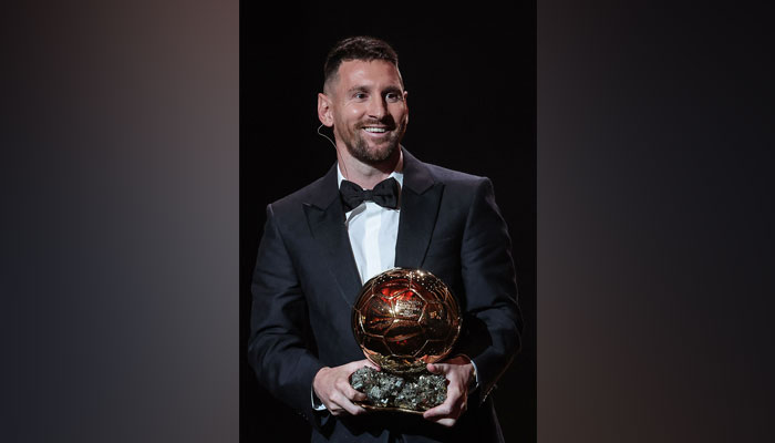 Inter Miami CFs Argentine forward Lionel Messi receives his 8th Ballon dOr award during the 2023 Ballon dOr France Football award ceremony at the Theatre du Chatelet in Paris on October 30, 2023. —  AFP