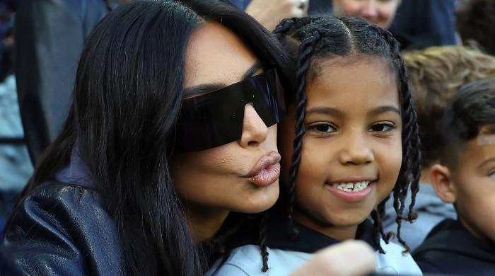 Kim Kardashian Kanye West’s Son Saint Flips Off The Paparazzi Again