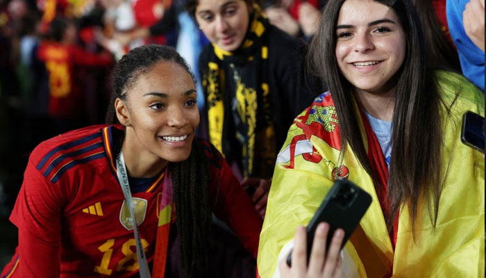 Soccer Football - FIFA Womens World Cup Australia and New Zealand 2023 - Final - Spain v England - Stadium Australia, Sydney, Australia - August 20, 2023 Spains Salma Paralluelo poses for photos with fans after winning the World Cup final.—Reuters
