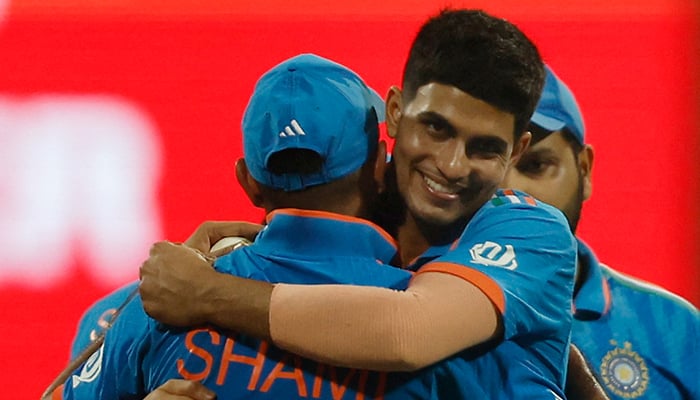 Cricket - ICC Cricket World Cup 2023 - India v Sri Lanka - Wankhede Stadium, Mumbai, India - November 2, 2023 Indias Shubman Gill celebrates with Mohammed Shami after the match. — Reuters