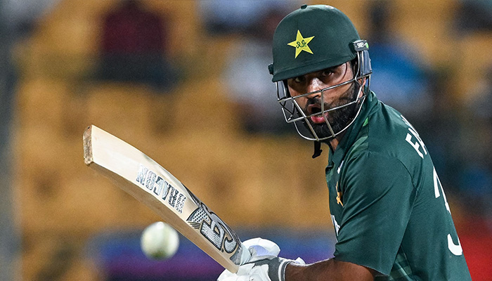 Pakistan´s Fakhar Zaman watches the ball after playing a shot during the 2023 ICC Men´s Cricket World Cup one-day international (ODI) match between New Zealand and Pakistan at the M. Chinnaswamy Stadium in Bengaluru on November 4, 2023. — AFP