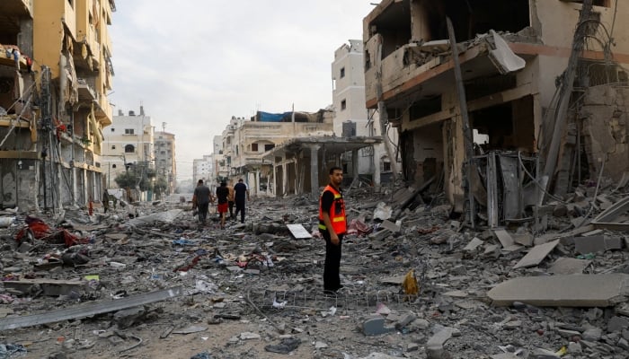 A rescuer looks on amid debris in the aftermath of Israeli strikes, in Gaza City, October 11, 2023. — Reuters