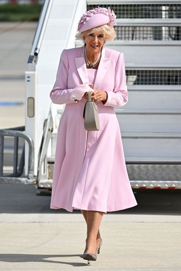 Photo: Queen Camilla in a pink dress