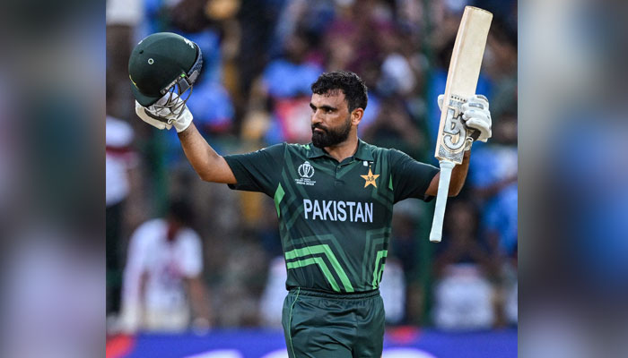 Pakistan’s Fakhar Zaman celebrates after scoring a century (100 runs) during the 2023 ICC Men’s Cricket World Cup one-day international (ODI) match between New Zealand and Pakistan at the M. Chinnaswamy Stadium in Bengaluru on November 4, 2023. — AFP