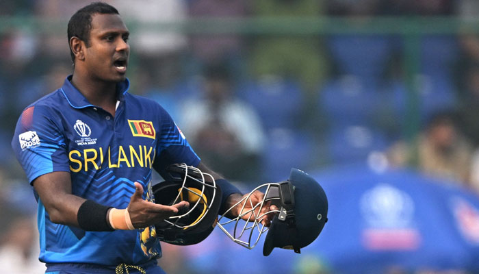 Sri Lanka’s Angelo Mathews reacts after he was timed out during the 2023 ICC Men’s Cricket World Cup one-day international (ODI) match between Bangladesh and Sri Lanka at the Arun Jaitley Stadium in New Delhi on November 6, 2023. — AFP