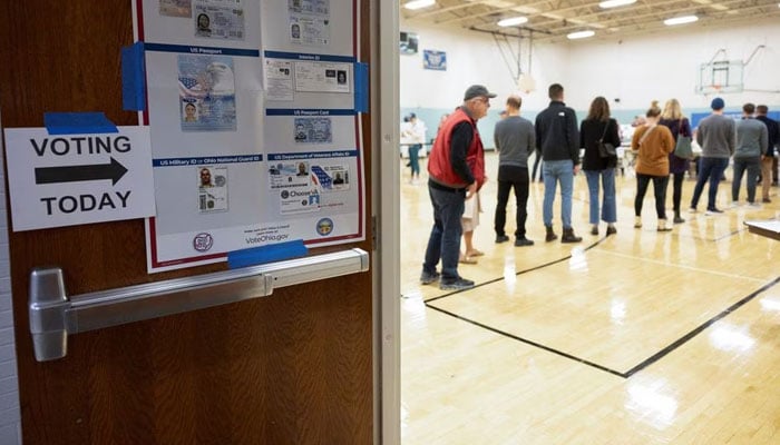 Voters line up in a polling location as voters in Ohio decide whether to enshrine abortion protections into the state constitution, in Columbus, Ohio, US November 7, 2023.—Reuters