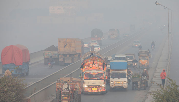 Vehicles move amid dense smog in Lahore, Pakistan November 24, 2021. — Reuters