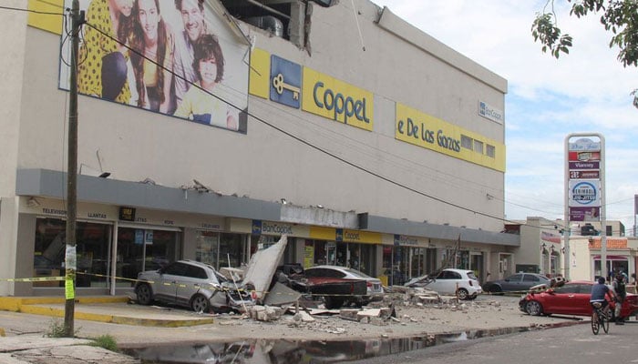 A general view shows vehicles damaged by the collapse of the facade of a department store during an earthquake, in Manzanillo, Mexico September 19, 2022.—Reuters/file