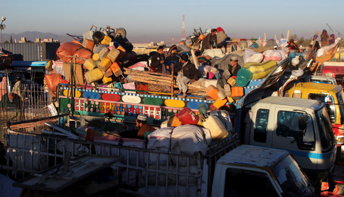 Afghan nationals with belongings sit atop a truck as they head back with their families to Afghanistan from Pakistan, at the Chaman Border Crossing along the Pakistan-Afghanistan Border in Balochistan Province, in Chaman, Pakistan November 10, 2023. — Reuters