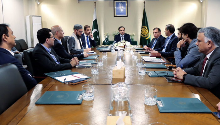 Caretaker Minister for IT and Telecommunication Dr Umar Saif addressing a meeting. — X/umarsaif