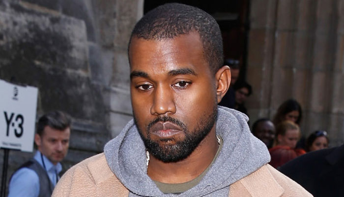 Kanye West gets in trouble for attempted hug?