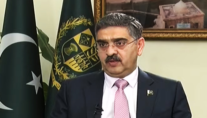 Caretaker Prime Minister Anwaar-ul-Haq Kakar during an interview on Geo News with Shahzad Iqbal, on November 25, 2023, in this still taken from a video. — Geo News