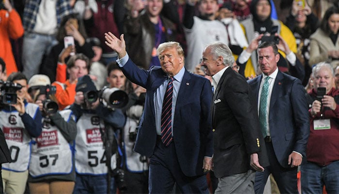 Former President Donald Trump with South Carolina Governor Henry McMaster during a game between the Clemson Tigers and the South Carolina Gamecocks at Williams-Brice Stadium inColumbia, South Carolina, US on November 25, 2023. — Reuters