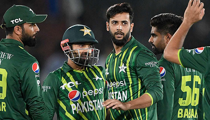 Pakistan´s Imad Wasim celebrates with teammates after taking a wicket in a match between Pakistan and New Zealand at the Rawalpindi Cricket Stadium in Rawalpindi, on April 20, 2023. — AFP