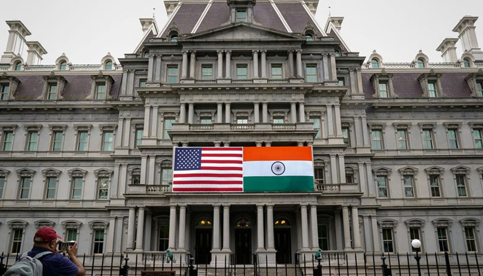 The flags of the United States and India are displayed on the Eisenhower Executive Office Building at the White House in Washington, US, June 21, 2023. — Reuters