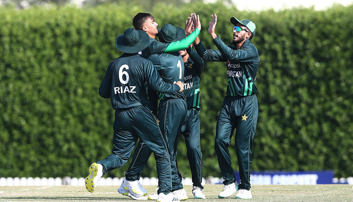 Pakistani cricketers celebrate after sending an Afghan batter to the pavilion on December 12, 2023. — PCB