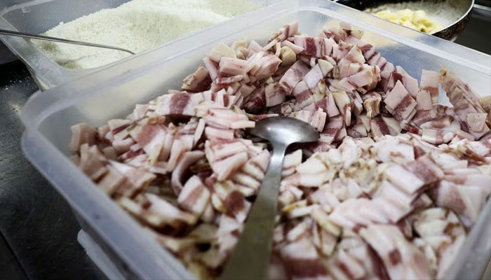 A view of sliced pig cheeks and pecorino cheese used to prepare pasta Carbonara at La Carbonara restaurant in Campo de Fiori in Rome, Italy, December 14, 2023.—Reuters