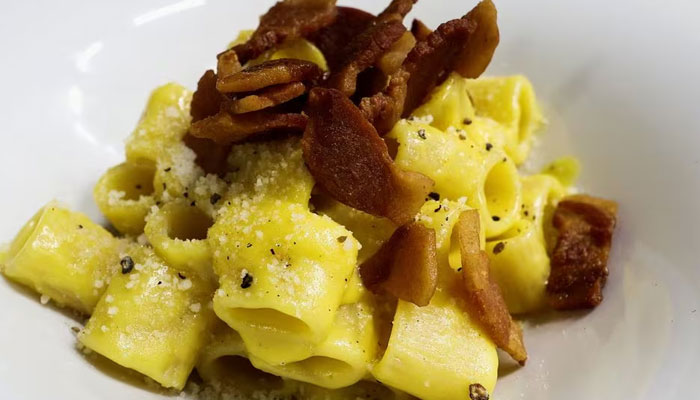 A view of a plate of pasta Carbonara at La Carbonara restaurant in Campo de Fiori in Rome, Italy, December 14, 2023.—Reuters