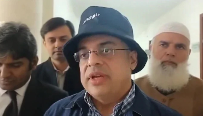 Ahad Cheema, adviser to caretaker prime minister on establishment, speaks with the journalists in this still taken from a video. — X/@MurtazaViews/File