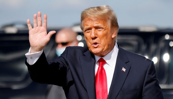 US President Donald Trump waves as he arrives at Palm Beach International Airport in West Palm Beach, Florida, US, January 20, 2021. —Reuters