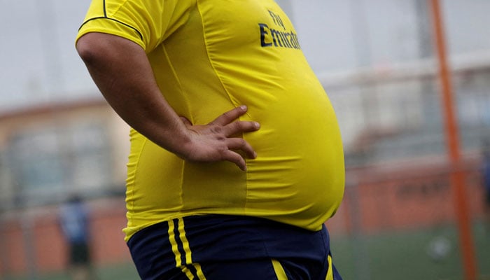 A player is pictured during his Futbol de Peso (Soccer of Weight ) league soccer match, a league for obese men who want to improve their health through soccer and nutritional counselling, in San Nicolas de los Garza, Mexico, September 16, 2017.—Reuters