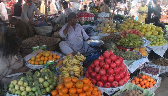 Vendors await customers at the Empress Market in Karachi on December 12, 2023. — Online