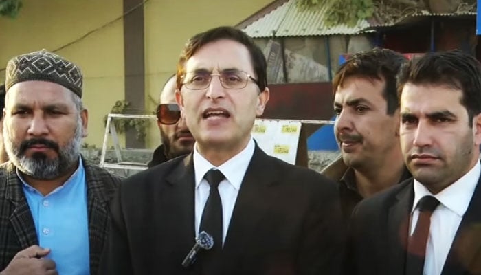 PTI now-former chairman Barrister Gohar Ali Khan interacts with journalists outside Adiala Jail in Rawalpindi, in this still taken from a video on December 23, 2023. — YouTube/ Geo News