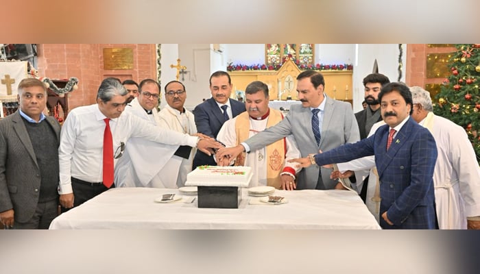 COAS General Syed Asim Munir (centre) celebrates Christmas at the Christ Church in Rawalpindi, on December 25, 2023. — ISPR