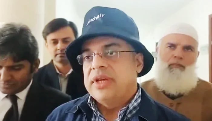 Ahad Cheema, adviser to caretaker prime minister on establishment, speaks with the journalists in this still taken from a video. — X/@MurtazaViews/File