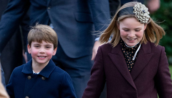 Prince Louis looks impatient and excited on Christmas morning with family