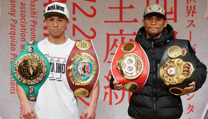 Japans Naoya Inoue (L) and Philippines Marlon Tapales pose for photos after a press conference in Yokohama on December 24, 2023, on their title match scheduled on December 26 at Tokyos Ariake Arena.