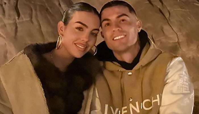 Georgina Rodriguez and Cristiano Ronaldo pose in this undated image. — Instagram/@georginagio