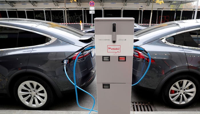 Tesla Model X electric cars recharge their batteries in Berlin, Germany, November 13, 2019.—Reuters