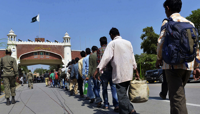Freed Indian fishermen arrive at the Wagah border, Lahore, in 2014. — AFP