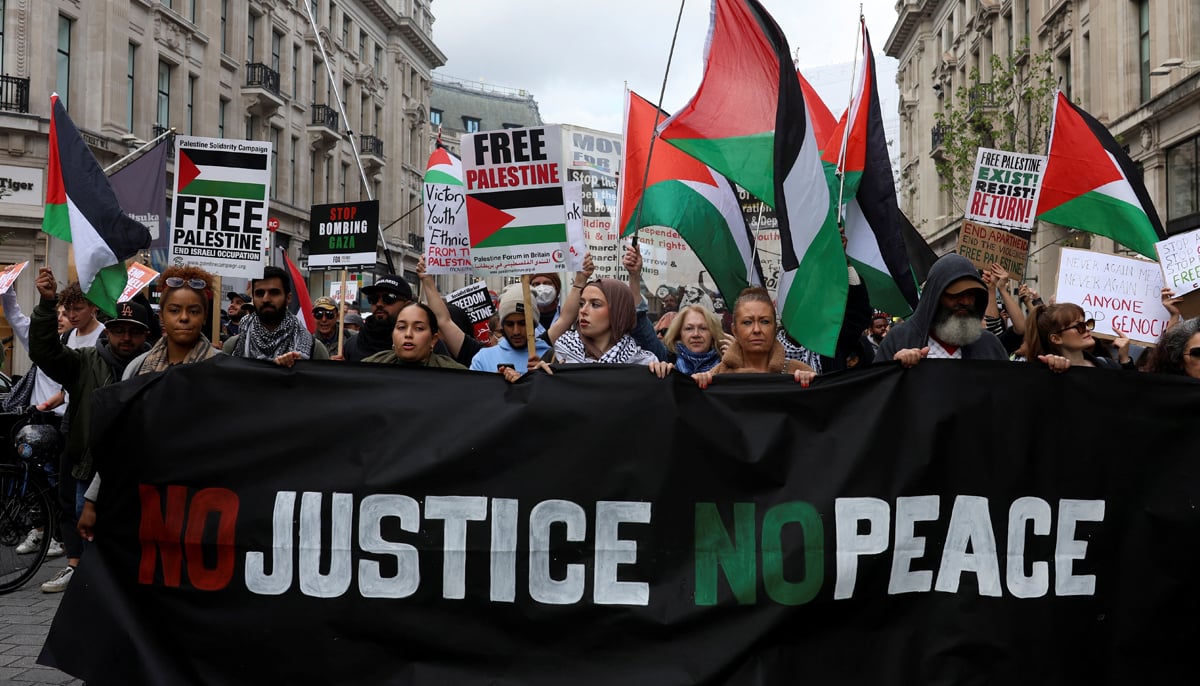 Demonstrators protest in solidarity with Palestinians, amid the ongoing conflict between Israel and the Palestinian group Hamas, in London, Britain, October 14, 2023. – Reuters