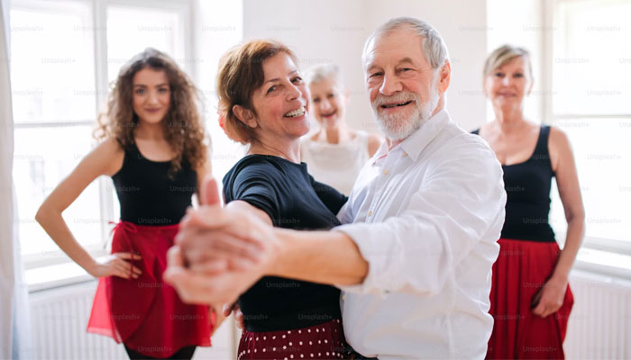 A representational picture shows a group of senior people attending a dance class. — Unsplash