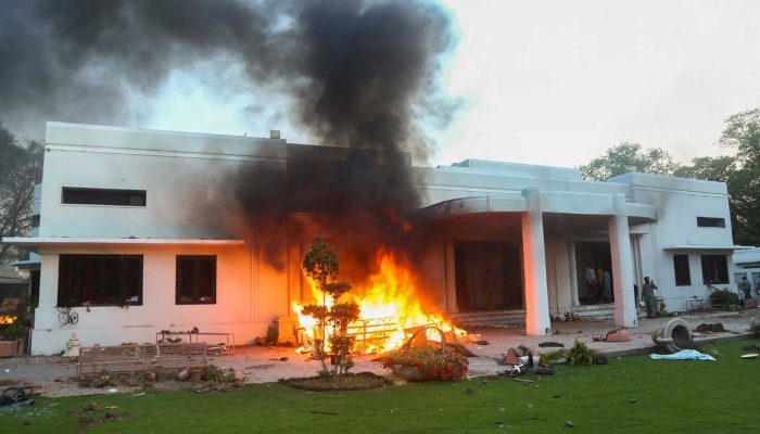 A view of a house in cantonment area, which was set afire by supporters of former prime minister Imran Khan during a protest against his arrest, in Lahore on May 9, 2023. — Reuters