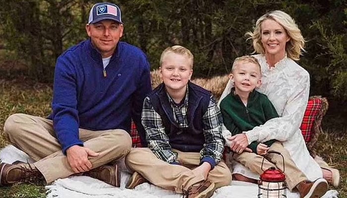 Cindy Mullins (right, pictured with her husband DJ and two young sons) has inspired many with her positive reaction to losing her limbs out of the blue, saying she is just so happy to be alive. —GoFundMe