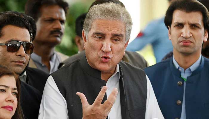 PTI leader Shah Mahmood Qureshi speaking to the media. — AFP/File