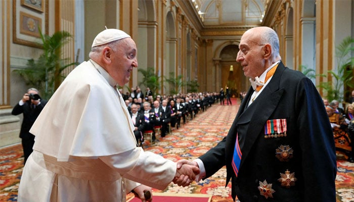 Pope Francis greets a member of the diplomatic corps accredited to the Vatican, at the Vatican January 8, 2024. — Reuters