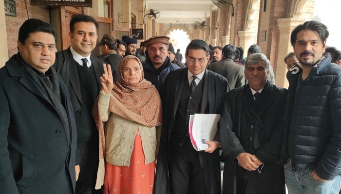 Rehana Imtiaz Dar poses for a photograph with PTIs legal team. — X/@SalmanKNiazi1