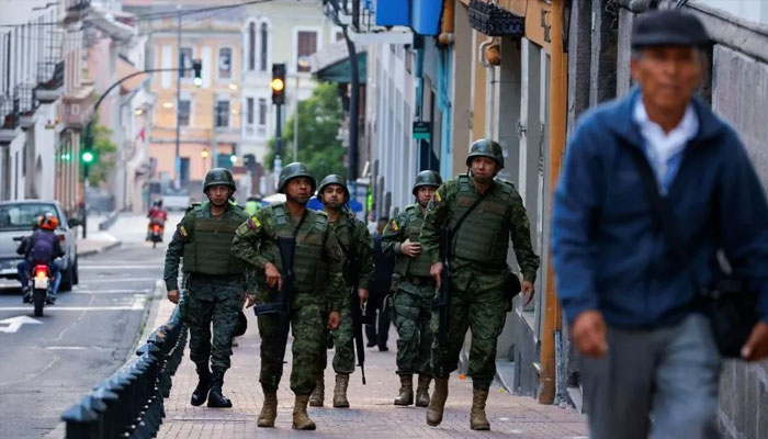 Heavily armed soldiers patrol Ecuadors streets after eruption of nationwide gang violence. —Reuters