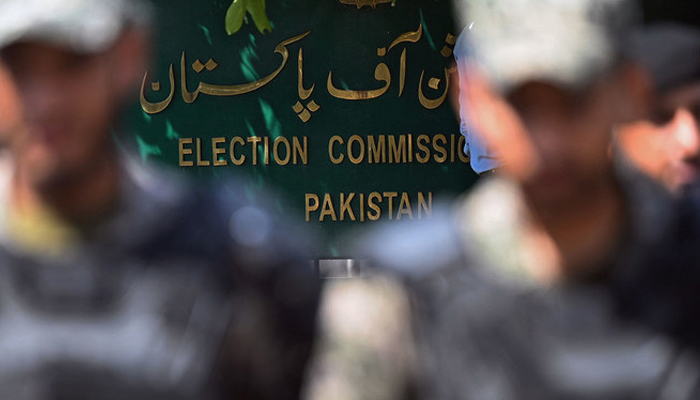 Paramilitary soldiers stand guard outside Pakistan’s election commission building in Islamabad on August 2, 2022. — AFP