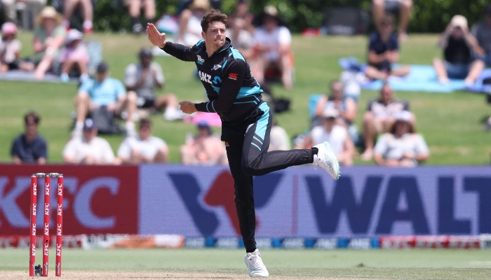 New Zealand´s Mitchell Santner bowls during the third Twenty20 cricket match between New Zealand and Bangladesh at Bay Oval in Mount Maunganui on December 31, 2023. —AFP